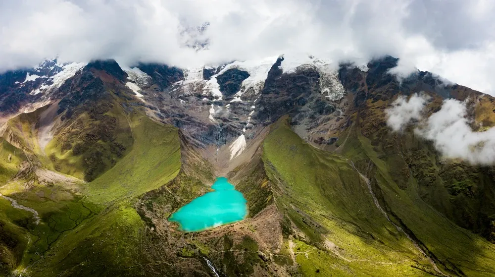 Humantay Lake from above, turquoise beneath its glacier