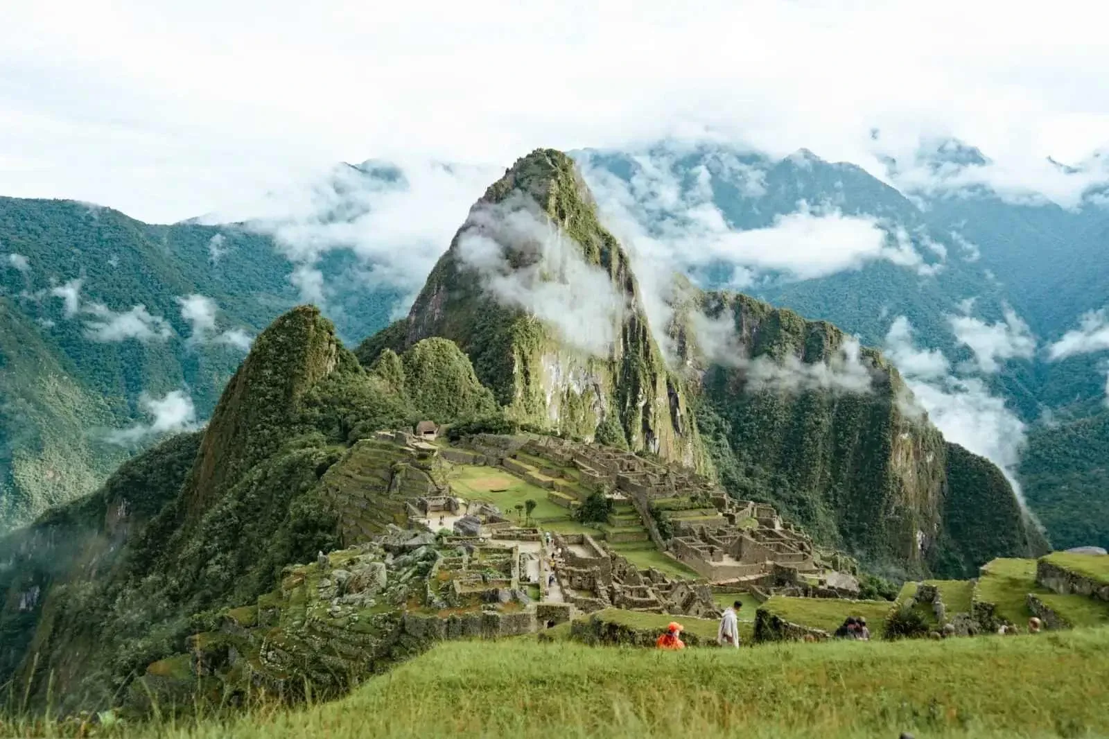 Machu Picchu in the green season with cloud on the peaks
