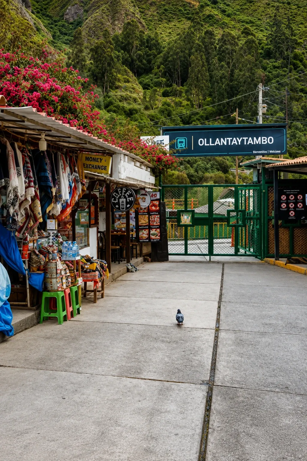 Market stalls leading to the gate of Ollantaytambo station