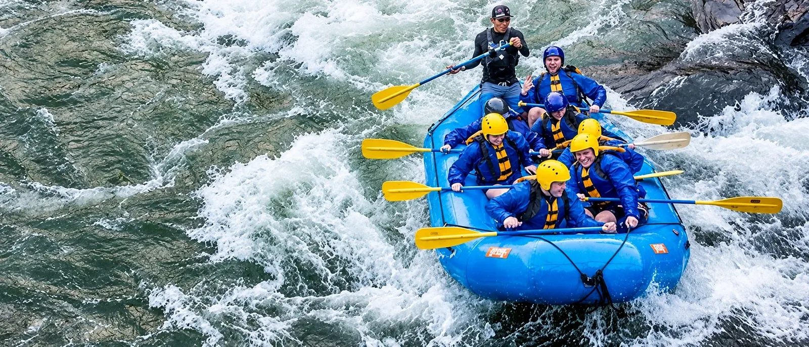 A raft running a rapid on the river