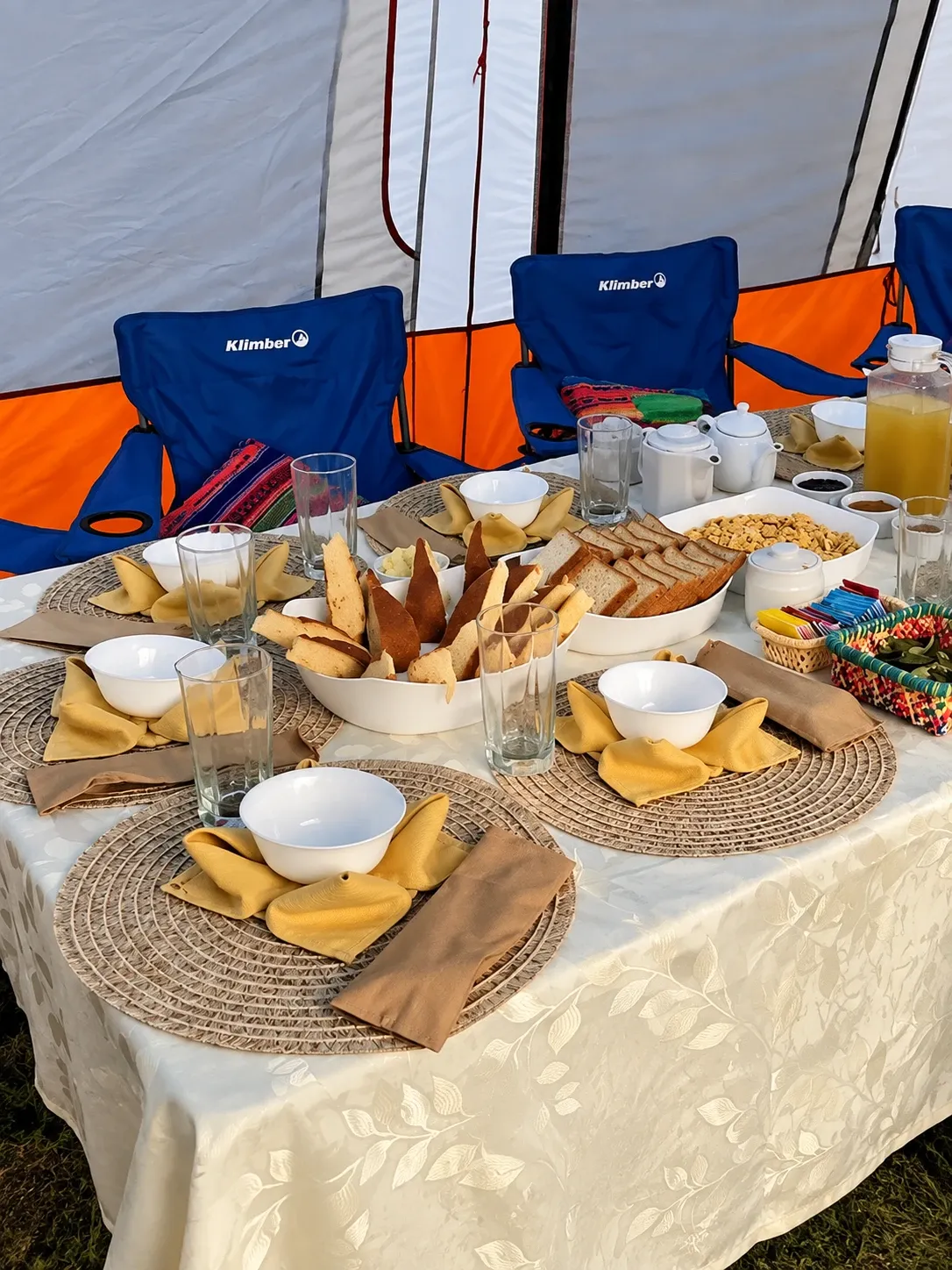 Breakfast laid out on a camp table